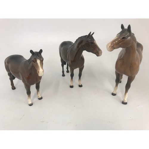 67 - COLLECTION OF 7 BROWN BESWICK HORSE MODELS TALLEST 21CM