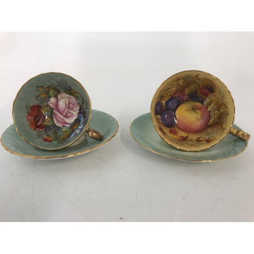 124 - TWO AYNSLEY CABINET CUP & SAUCERS  ONE FRUIT ONE FLORAL SIGNED J A BAILEY