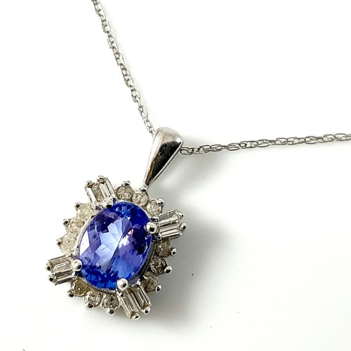 610 - MOONSTONE NECKLACE AND A 14K GOLD DIAMOND AND TANZANITE PENDANT WITH ORIGINAL RECEIPT ‘RETAIL PRICE ... 