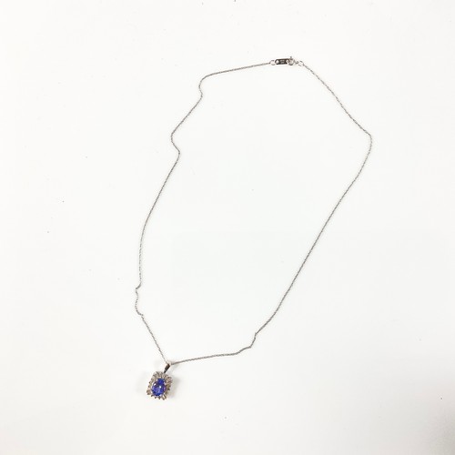 610 - MOONSTONE NECKLACE AND A 14K GOLD DIAMOND AND TANZANITE PENDANT WITH ORIGINAL RECEIPT ‘RETAIL PRICE ... 