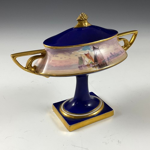 125 - JAMES EDWIN DEAN FOR MINTON, A TWIN HANDLED PEDESTAL VASE AND COVER, CIRCA 1920, GILDED ANGULAR AND ... 