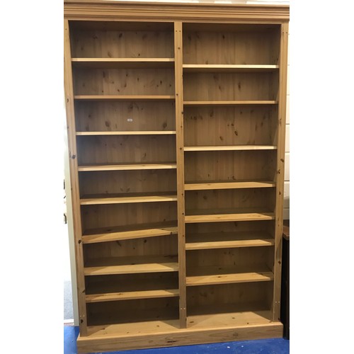 612 - TALL PINE DOUBLE BOOKCASE WITH 15 SHELVES, APPROX. 240 cm high x 153 cm wide