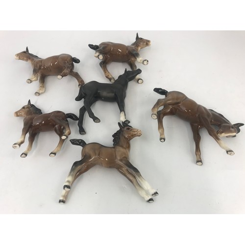 75 - COLLECTION OF 6 BESWICK FOAL MODELS TALLEST 15CM (please note, one of the foals has 2 broken front l... 