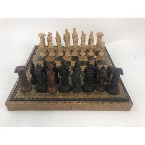 56 - METAL, MARBLE & RESIN CHESS SETS WITH A CHESS CHAMPION 2150 L GO