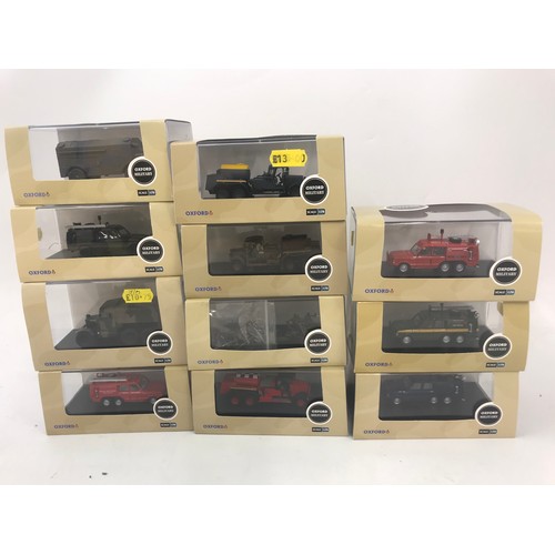 147 - OXFORD DIECAST, 11 PLASTIC BOXED OXFORD MILITARY SERIES, MILITARY FIRE ENGINES, LAND ROVERS ETC, PLU... 