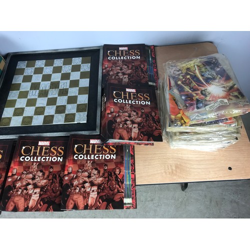 71 - A NOVELTY MARVEL CHESS SET, BOARD, & 32 BOXED PIECES