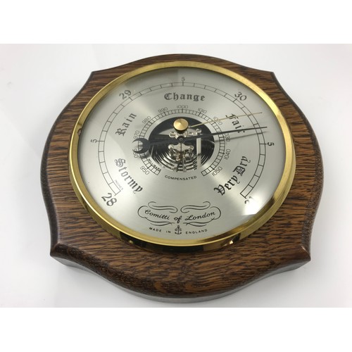 189 - KNIGHT GIBBINS, LONDON WALNUT VENEER MANTLE CLOCK TOGETHER WITH AN ANEROID BAROMETER