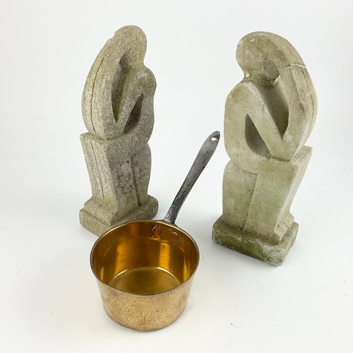 208 - A BRASS SAUCEPAN WITH RIVETED IRON HANDLE TOGETHER WITH TWO SMALL CONCRETE ABSTRACT SEATED CHARACTER... 