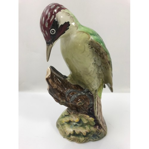 76 - BESWICK MODEL OF A WOODPECKER 1218 WITH A BESWICK BALD EAGLE 1018