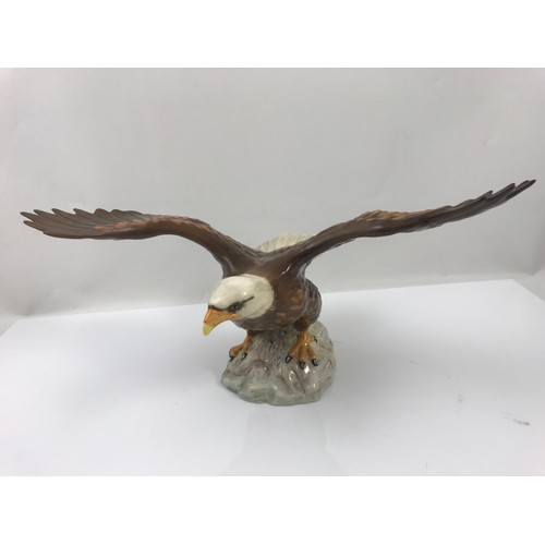 76 - BESWICK MODEL OF A WOODPECKER 1218 WITH A BESWICK BALD EAGLE 1018