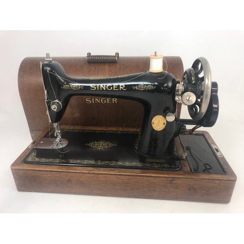 351 - SINGER SEWING MACHINE IN CASE