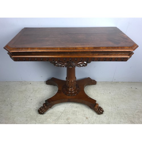 639 - A WILLIAM IV MAHOGANY GAMES TABLE, CARVED FOLIATE DECORATION, ON PILLARED SUPPORTS QUATREFOIL BASE A... 