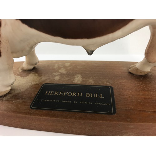 79 - BESWICK CONNOISSEUR HEREFORD BULL ON WOODEN PLINTH