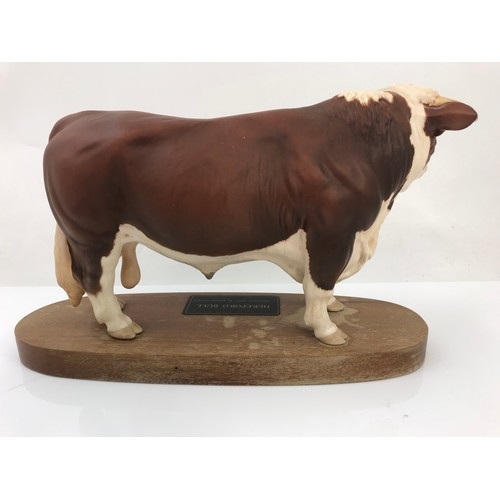 79 - BESWICK CONNOISSEUR HEREFORD BULL ON WOODEN PLINTH