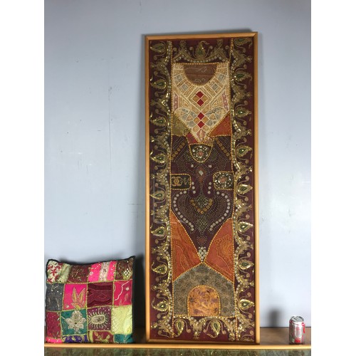 304 - TWO FRAMED INDIAN EMBROIDERIES AND AN EMBROIDERED CUSHION