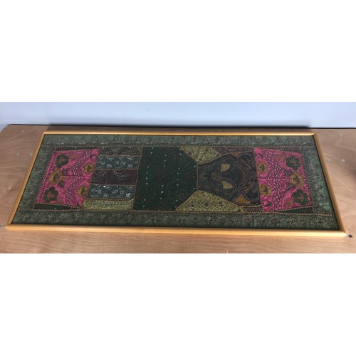 304 - TWO FRAMED INDIAN EMBROIDERIES AND AN EMBROIDERED CUSHION