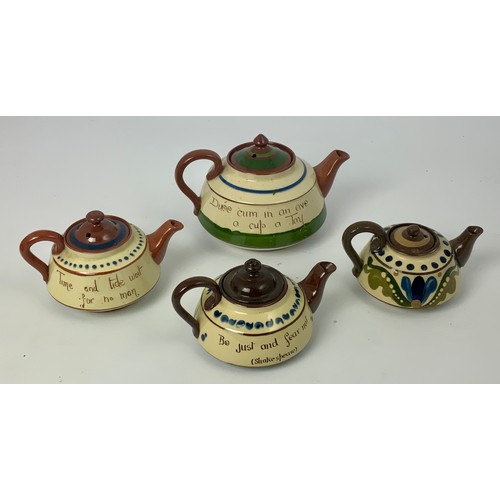 127 - 4 TORQUAY MOTTOWARE TEAPOTS AND OTHER ITEMS