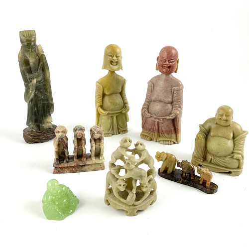 285 - A COLLECTION OF CARVED SOAPSTONE, ONYX AND GLASS MOULDED FIGURES DEPICTING BUDDHA, TUMBLING MONKEYS ... 