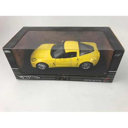 59 - HOT WHEELS 1:18 SCALE DIE CAST MODEL, CORVETTE IN YELLOW, WITH PACKING BANDING, PLUS MONDO SILVER CO... 