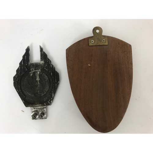 18 - OAK MOUNTED RILEY CAR BADGE AND A ST. CHRISTOPHER SAFETY AND COURTESY BUMPER BAR MOUNTED CAR BADGE