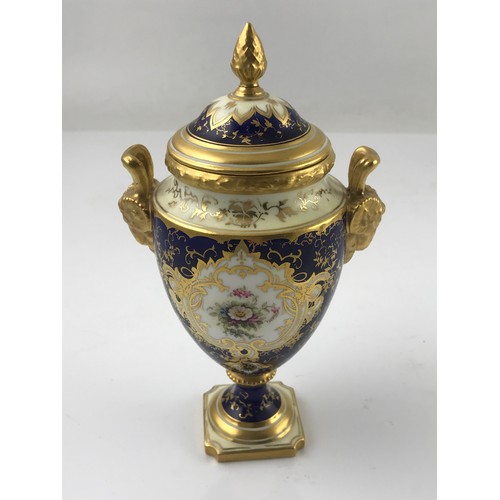 152 - COALPORT VASE & COVER WITH HAND PAINTED FLORAL CARTOUCHE & RAMS HEAD HANDLES WITH A HAND PAINTED  CA... 