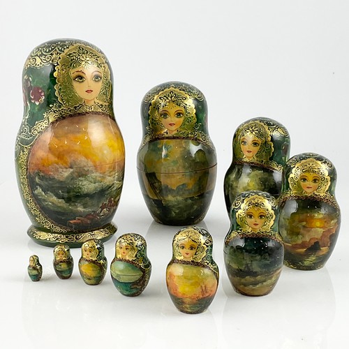 270 - A RUSSIAN MATRYOSHKA STACKING DOLL, 10 GRADUATED PAINTED AND LACQUERED SECTIONS,  SIGNED AND TITLED ... 