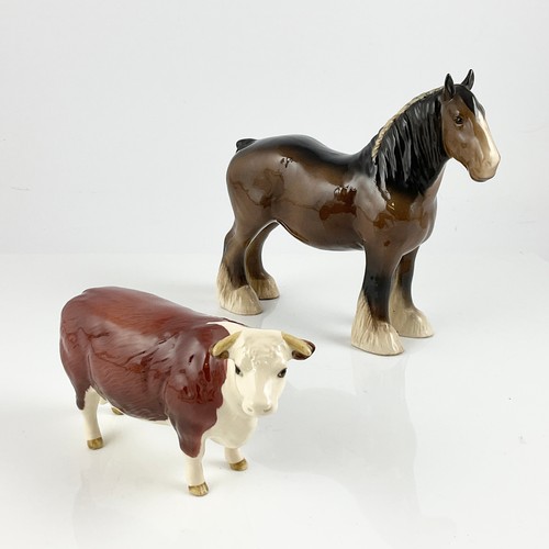 70 - A BESWICK MODEL OF A BROWN SHIRE HORSE AND ANOTHER OF A HEREFORDSHIRE COW. (2)