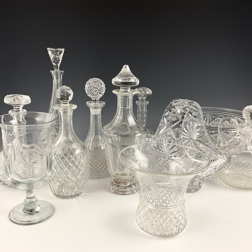 224 - A COLLECTION OF CUT GLASS INCLUDING DECANTERS, BOWL, SWING HANDLES BASKET, DRINKING GLASSES ETC