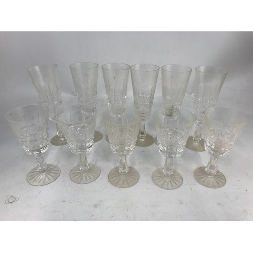 225 - 6 WATERFORD CRYSTAL FLUTED GLASSES  & 5 WINE GLASSES