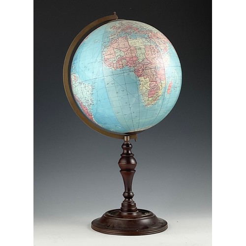 342 - A TERRESTRIAL GLOBE ON TURNED WOODEN STAND, 60CM HIGH