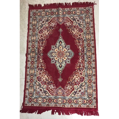 666 - RED GROUND RUG 141cm x 96cm