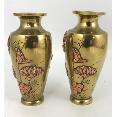 259 - PR. ORIENTAL RELIEF DECORATED COPPER AND BRASS VASES, EACH APPROX. 15.5 cm