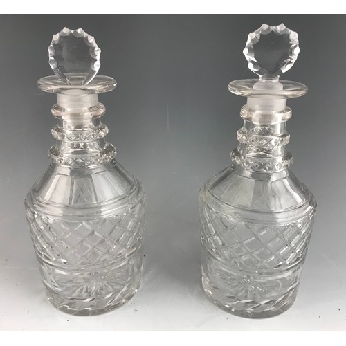 221 - PAIR OF CUT GLASS DECANTERS 22cm TALL