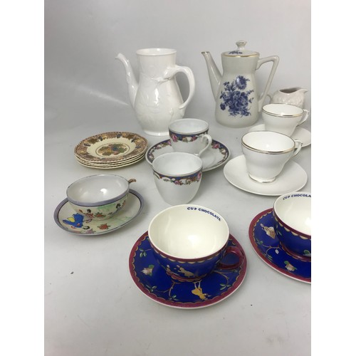 209 - TWO UNUSUAL WEDGEWOOD CHOCOLATE CUPS AND  MEAKIN SAUCERS WITH ORIENTAL DESIGN (MADE FOR CADBURYS CHO... 