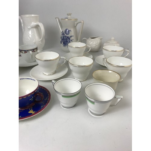 209 - TWO UNUSUAL WEDGEWOOD CHOCOLATE CUPS AND  MEAKIN SAUCERS WITH ORIENTAL DESIGN (MADE FOR CADBURYS CHO... 