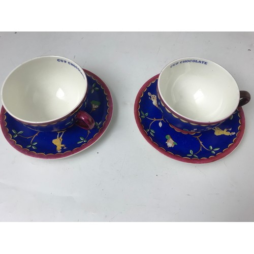 209 - TWO UNUSUAL WEDGEWOOD CHOCOLATE CUPS AND  MEAKIN SAUCERS WITH ORIENTAL DESIGN (MADE FOR CADBURYS CHO... 