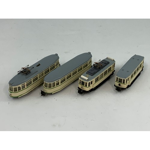 351 - CONTINENTAL H0 GAUGE, TWO POWER SINGLE DECK CAR TRAMS PLUS 2 TRAM CAR TRAILERS. GERMAN MAKE.