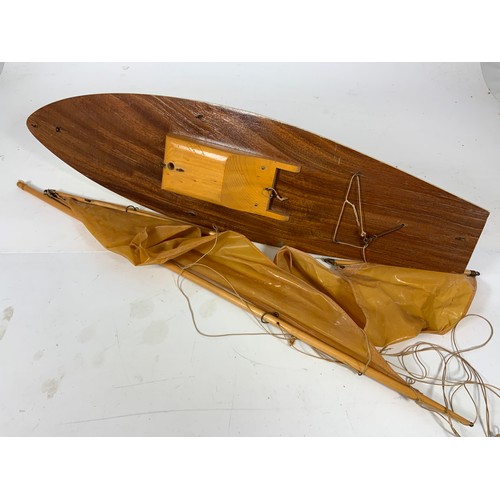 75 - MODEL YACHT, SEA ROVER , WOODEN HULLED, MAST & SAILS IN A BOX