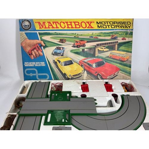 91 - MATCHBOX MOTORISED MOTORWAY SET, CARS TRACK & CONTROLLERS AS SHOWN, ( may not be complete)