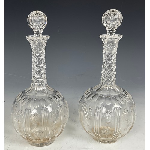 227 - PAIR OF DECANTERS AND A VINE ENGRAVED WATER JUG AND TWO FLUTES