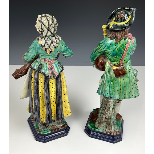 111 - PAIR OF CONTINENTAL POTTERY FIGURES  APPROX 33CM