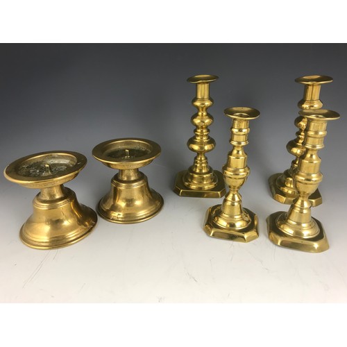 282 - 2 PAIRS OF BRASS CANDLESTICKS & A PAIR OF HEAVY BRASS PRIKET CANDLESTICKS