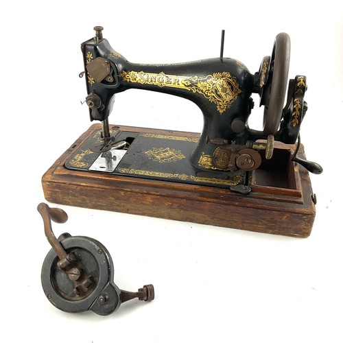 341 - A SINGER HAND DRIVEN SEWING MACHINE