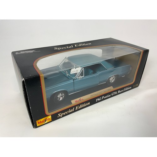 185 - MAISTO, 2 BOXED SPECIAL EDITION 1:18 SCALE CARS, 1965 PONTIAC GTO HURST EDITION, & BMW 645 CI.