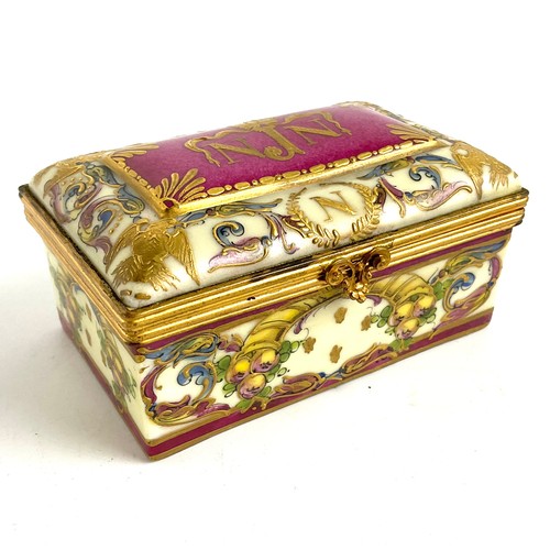 75 - M IMP DE SEVRES GILT METAL MOUNTED PORCELAIN TRINKET BOX, MONGRAMMED TO THE LID NJN, ON A PUCE GROUN... 