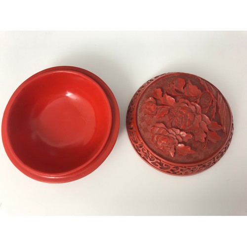 325 - ROUND CHINESE CINNEBAR LACQUER BOX WITH CARVED DECORATION 9cm DIAMETER