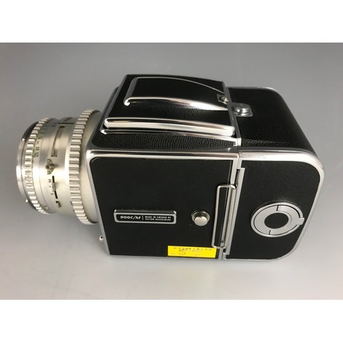 257 - HASSELBLAD CAMERA 500C/M.  WAIST LEVEL FINDER.  A12 BACK.  FITTED WITH SILVER FINISH f=80mm ZEISS T*... 