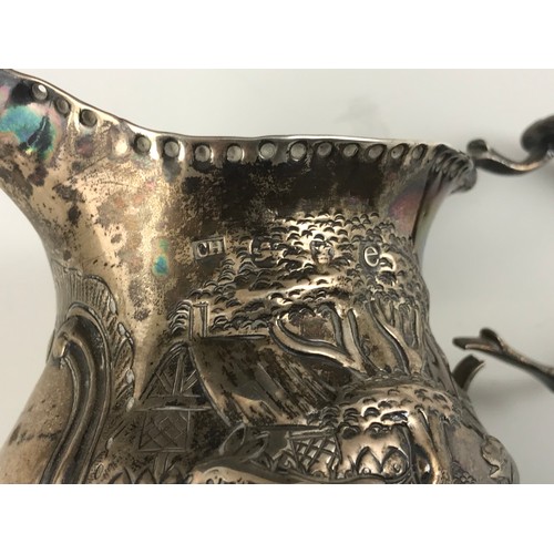 402 - HALLMARKED SILVER EMBOSSED JUG LONDON 1820 APPROX  80G