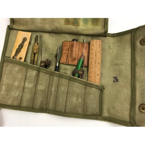 185 - VARIOUS CANVAS AND LEATHER MILITARY POUCHES AND CONTENTS