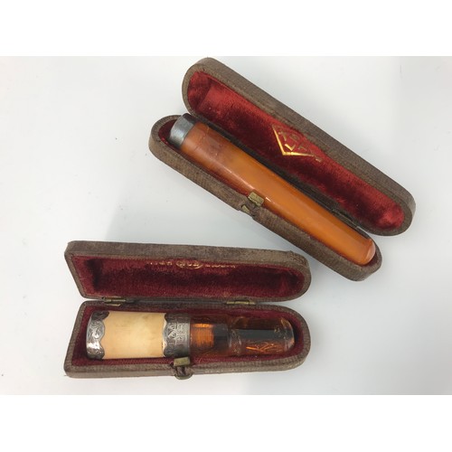 293 - 2 SILVER COLLARED CHEROOT HOLDERS WITH CASES, ORLIK BOND STREET LEATHER CIGAR CASE, BRONZE EFFECT BO... 